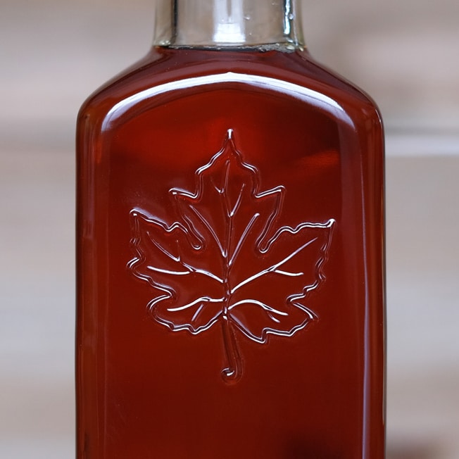 Folia decorative glass maple syrup glass bottle. Embossed leaf.